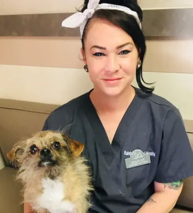 Ashley and small dog at Rainbow Animal Hospital
